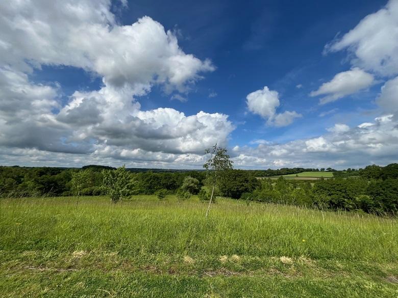 View over hills with cloudy sky